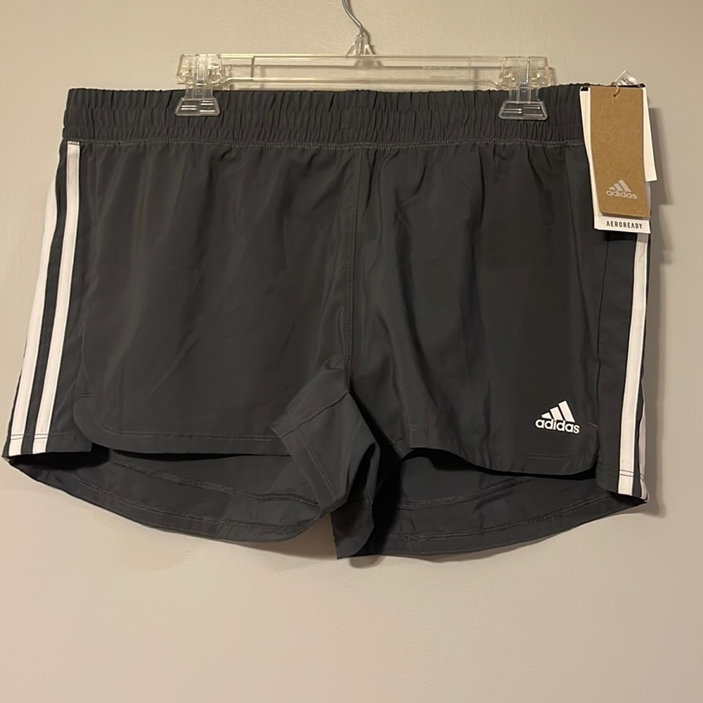 Brand new XL Adidas shorts. Gray with the three white strips.